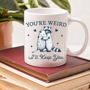 🦝 You're Weird, I'll Keep You – Funny Raccoon & Opossum Animal Saying Mug –11oz